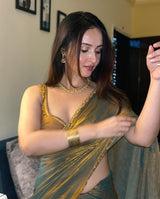 Elegant shimmer Tissue Teal Blue saree Lightweight & Stylish Drape